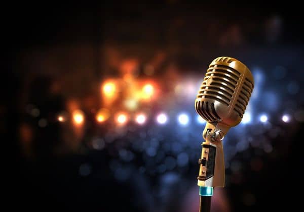 Stock photo of an old-fashioned microphone against a blurred background